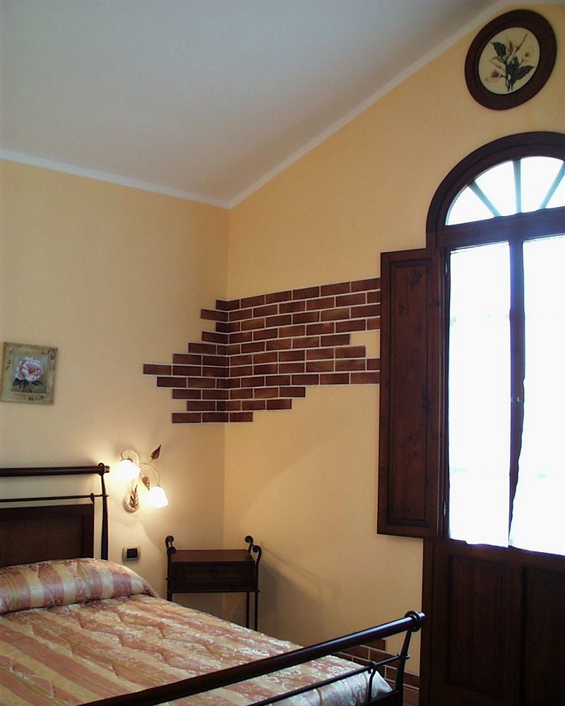 Hotel La Corte Rosada Villasimius Buitenkant foto